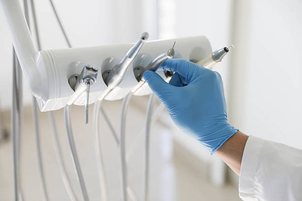 Professional Tooth Extraction technician working in Calvert, TX